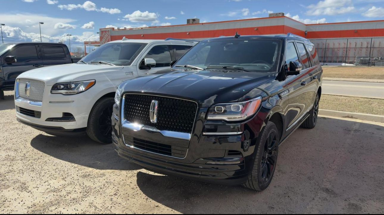 Luxury SUV at city nightlife